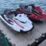 2 jet skis drive on floating dock