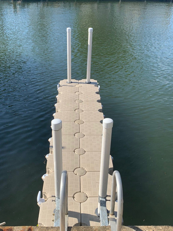 Candock floating dock converts a 1 slip wooden dock into 2 perpendicular docks
